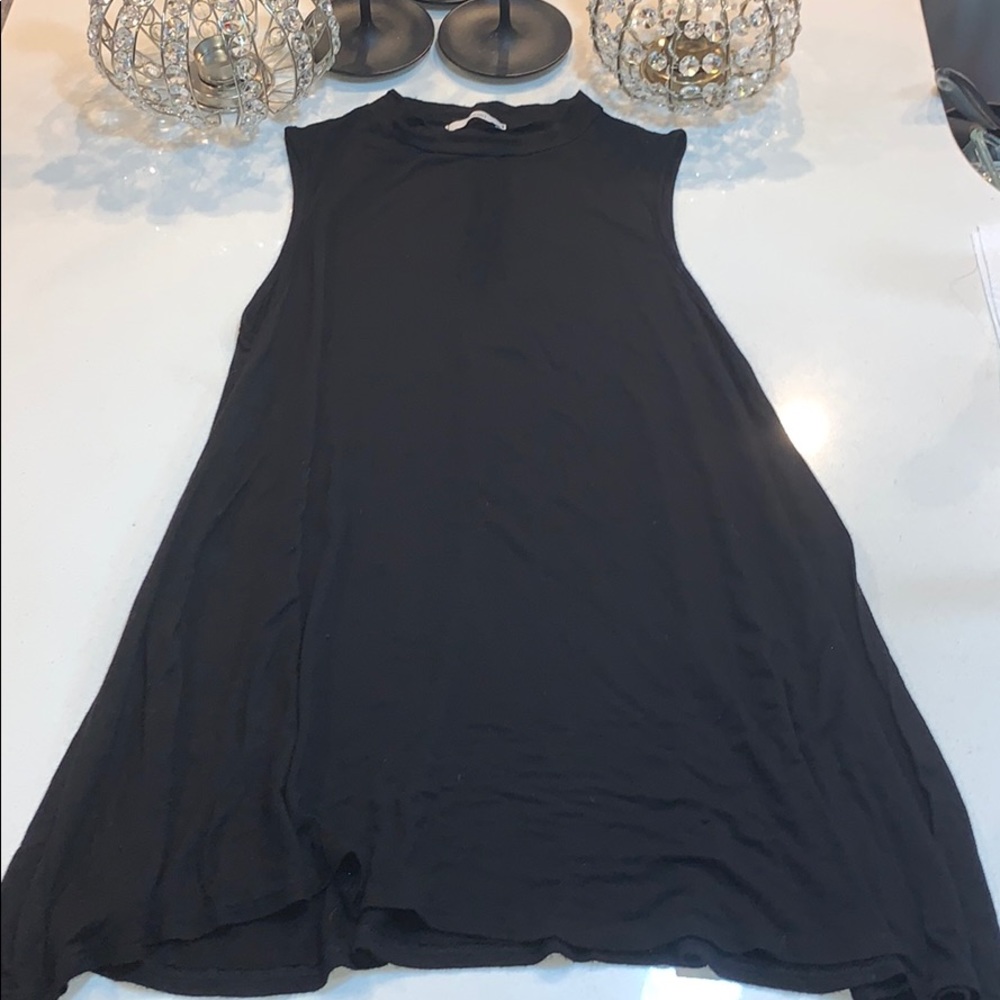 Never worn soft sleeveless black mini dress